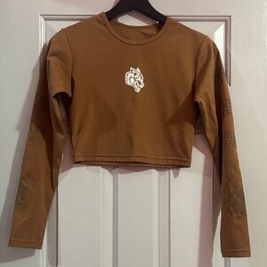 Darc Sport Women’s Cropped Long-Sleeve Top in Brown dry Fit